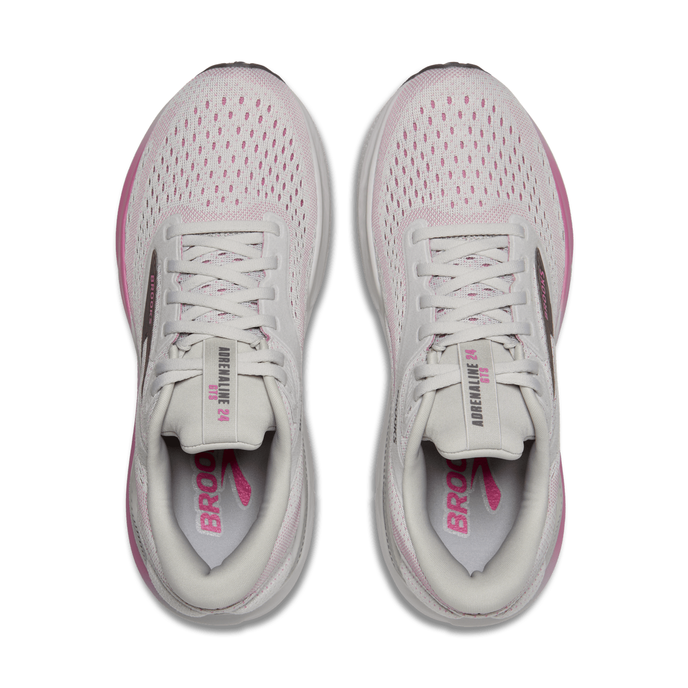 Pair of pink running shoes with visible branding on a transparent background