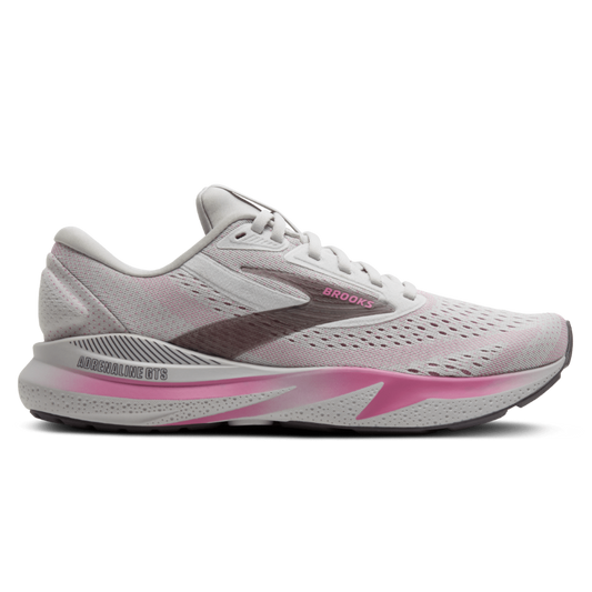 White and pink running shoe with 'Brooks' branding on a white background