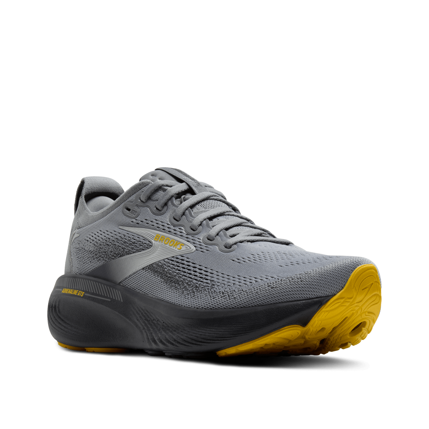 Gray running shoe with yellow sole on a transparent background