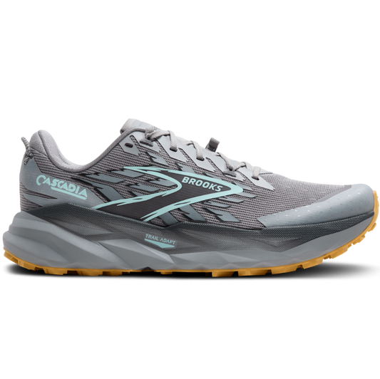 Gray running shoe with yellow sole on a white background