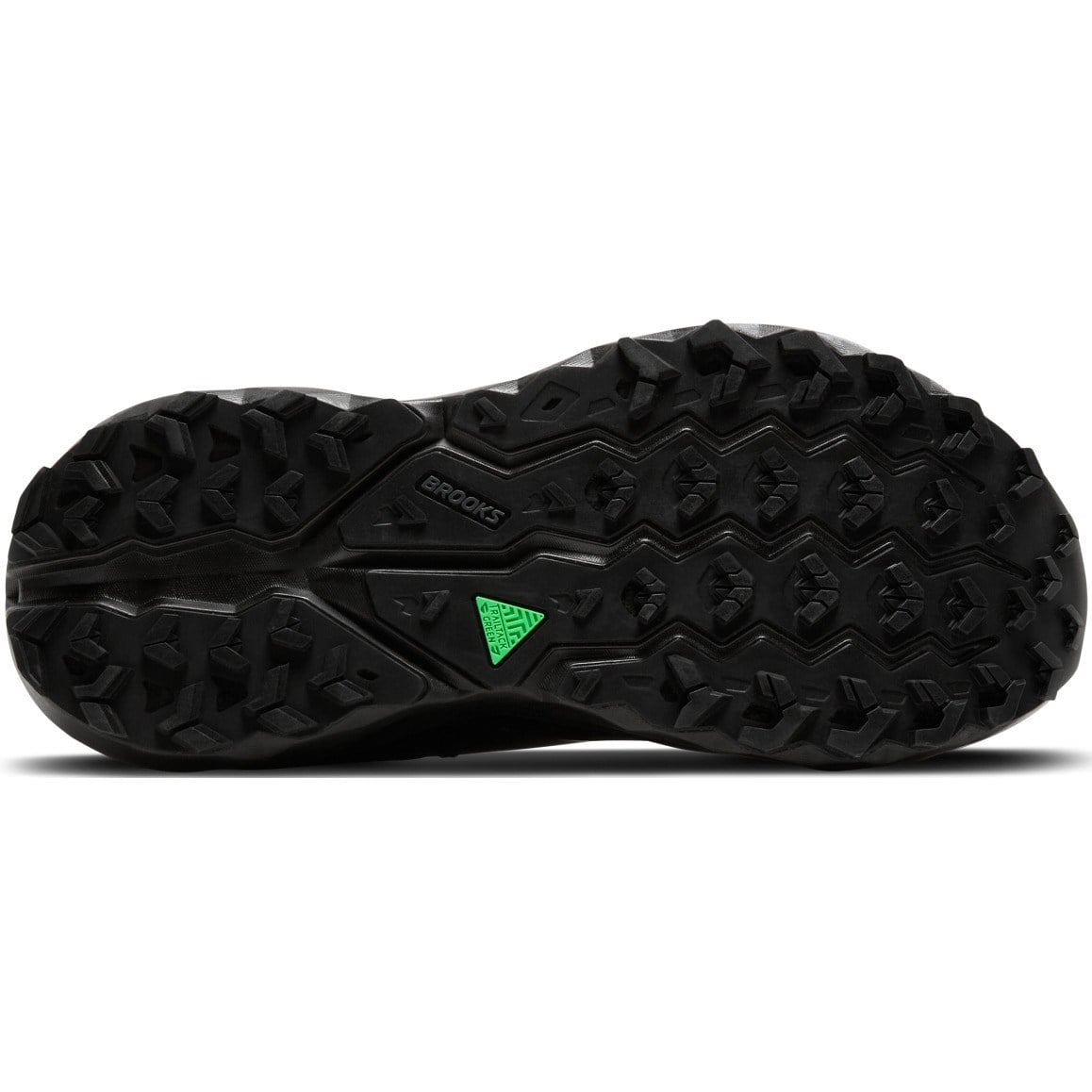 Black shoe sole with green triangle logo on a white background