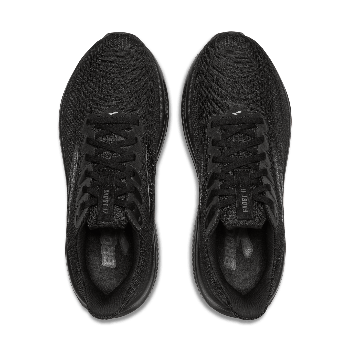 Pair of black running shoes on a transparent background