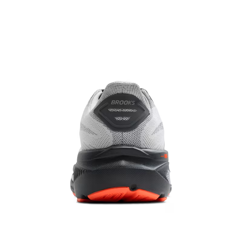 Back view of a gray and orange running shoe with 'Brooks' branding on a white background
