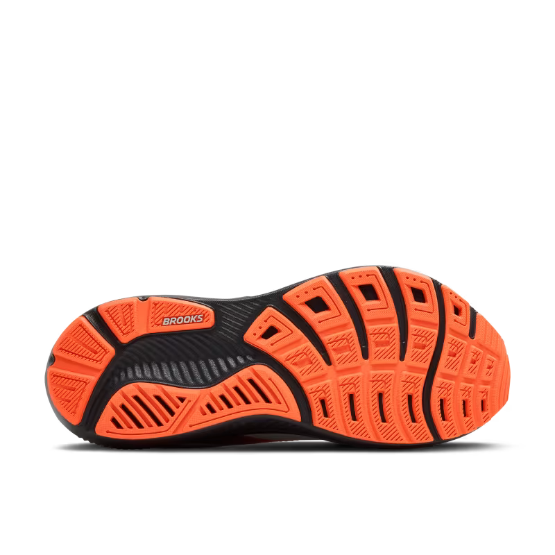 Orange and black running shoe sole with 'Brooks' branding on a white background