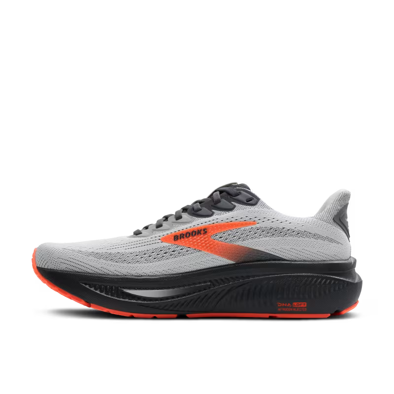 Gray running shoe with orange accents on a white background