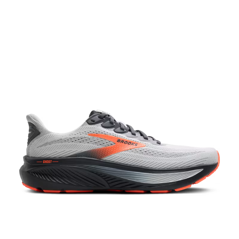 Gray and orange running shoe with 'Brooks' branding on a white background