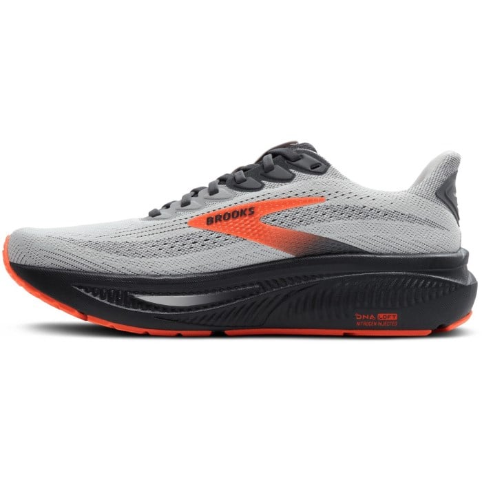 Gray running shoe with orange accents on a white background