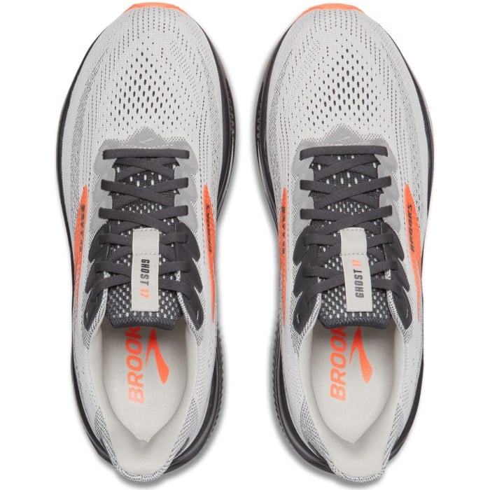 Gray running shoes with orange accents and 'Brooks' branding on a white background