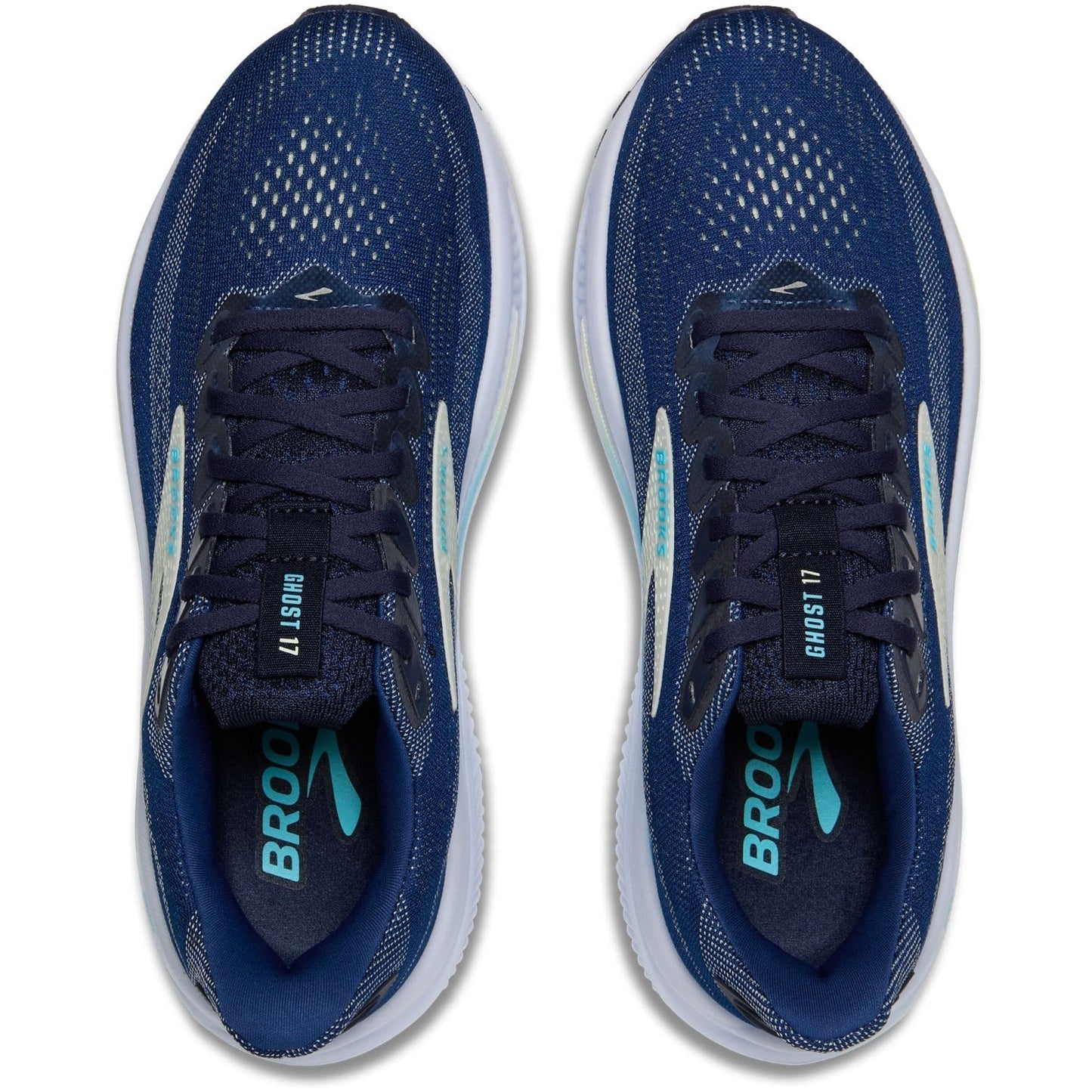 Pair of blue running shoes with white soles on a white background