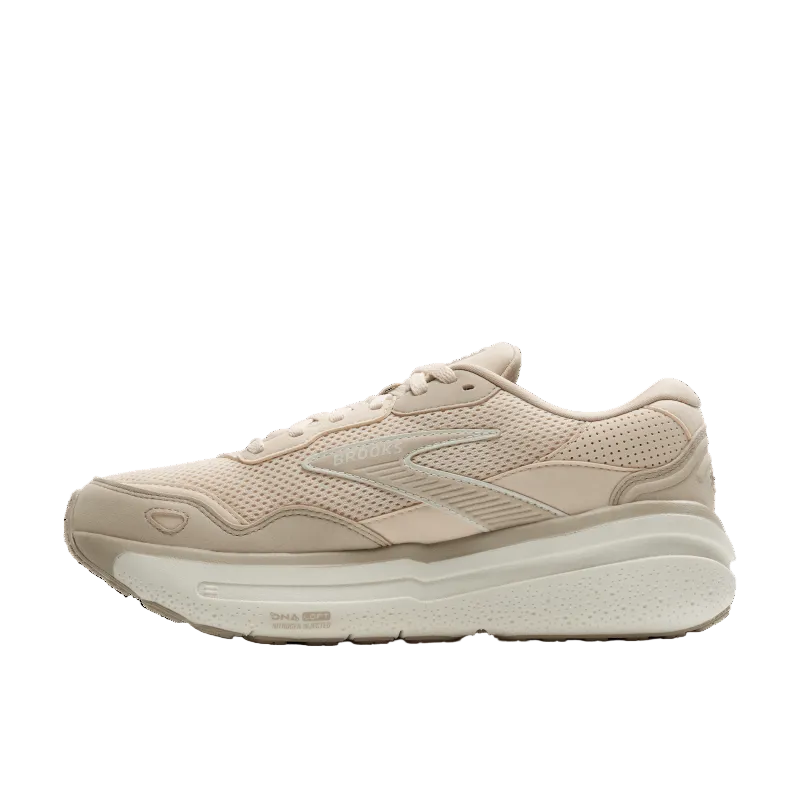 Beige running shoe with white sole on a transparent background