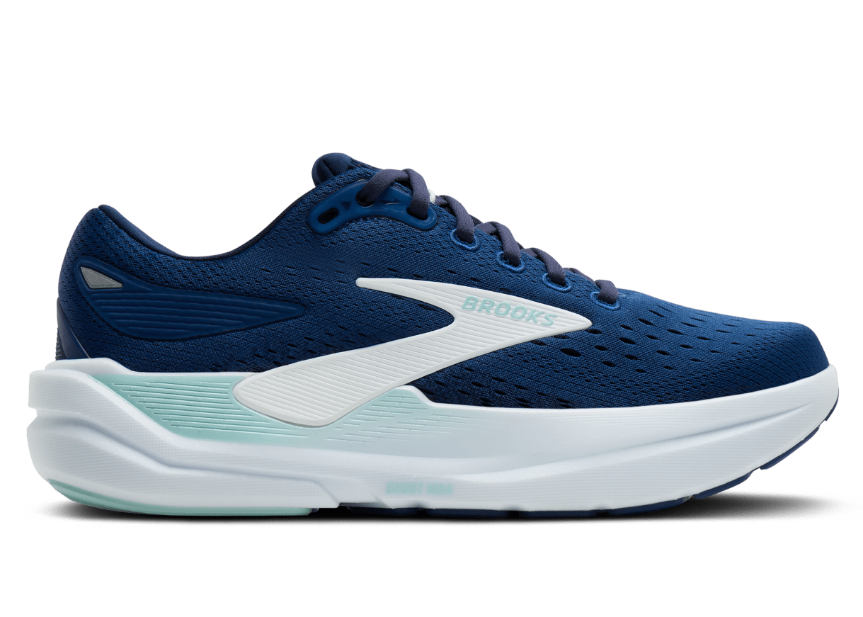 Blue running shoe with white sole on a white background