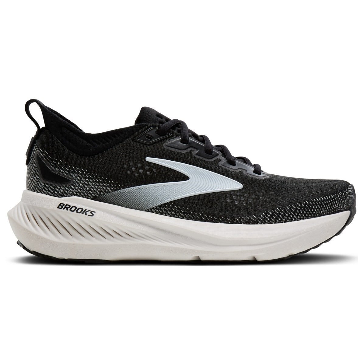 Brooks running shoe in black and white with a silver Brooks logo on the side, shown in a side profile view against a white background.