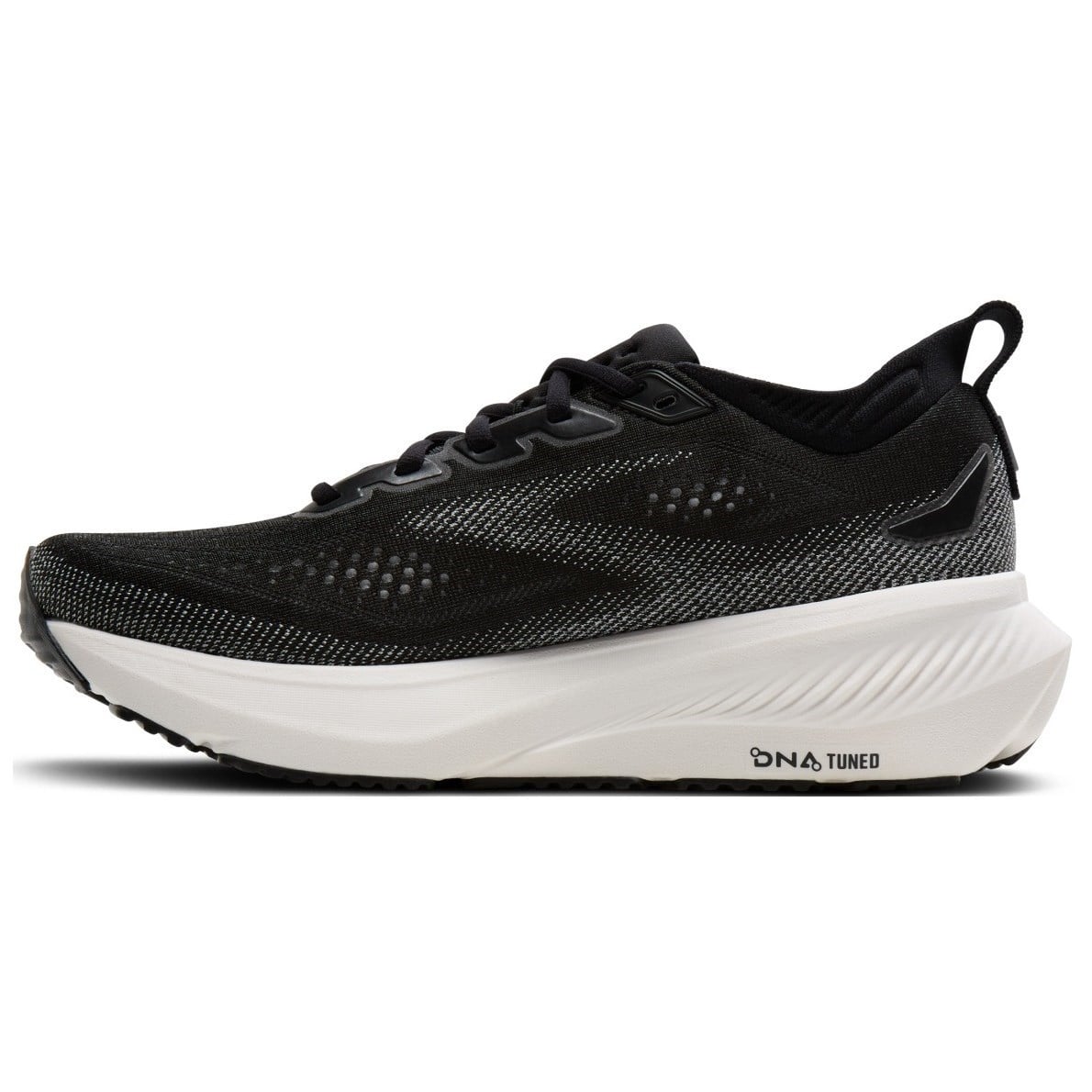 Navy running shoe with white sole on a white background