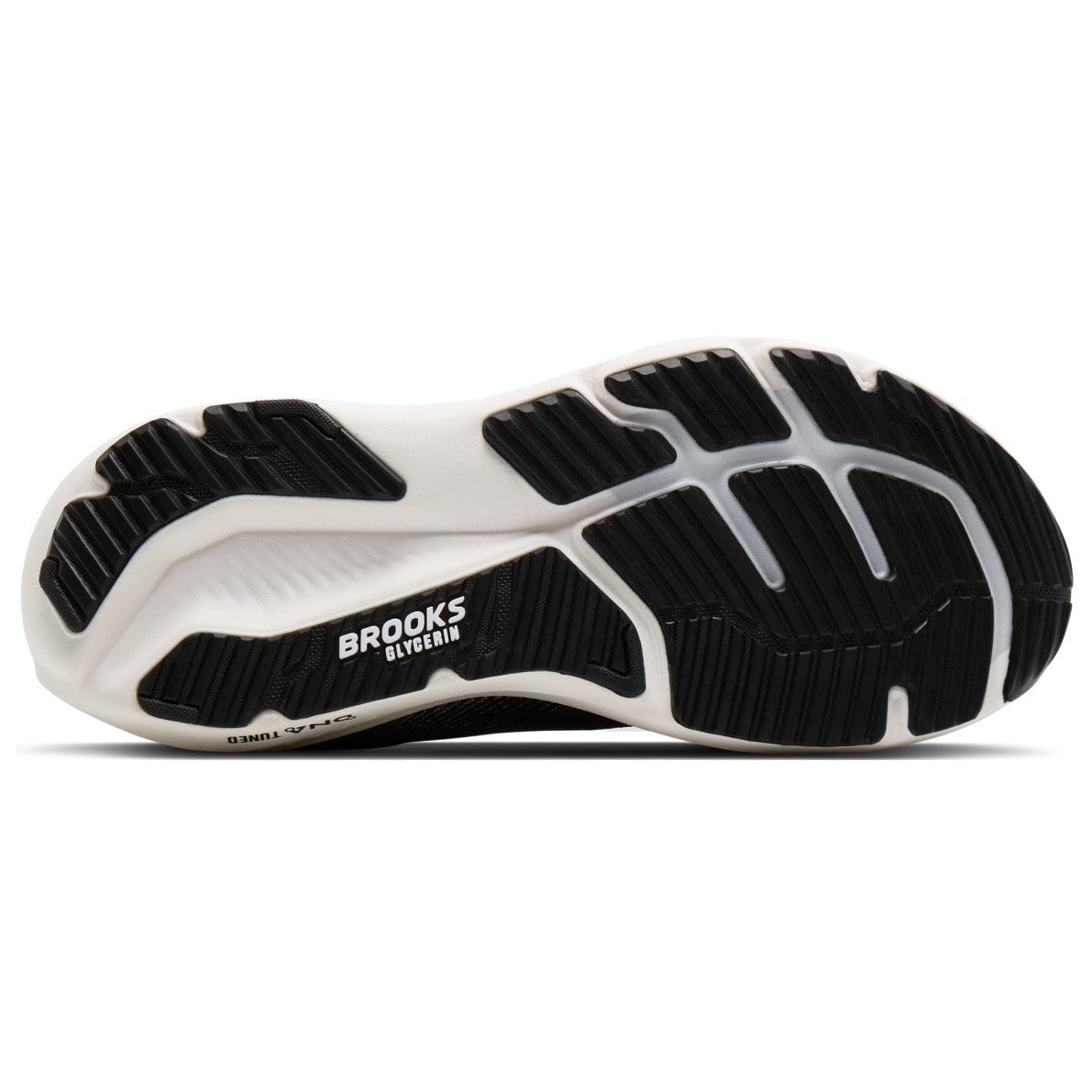 A close-up of a Brooks Running shoe sole, showing the black and white tread pattern and the 'BROOKS RUNNING' logo printed on the white midsole.