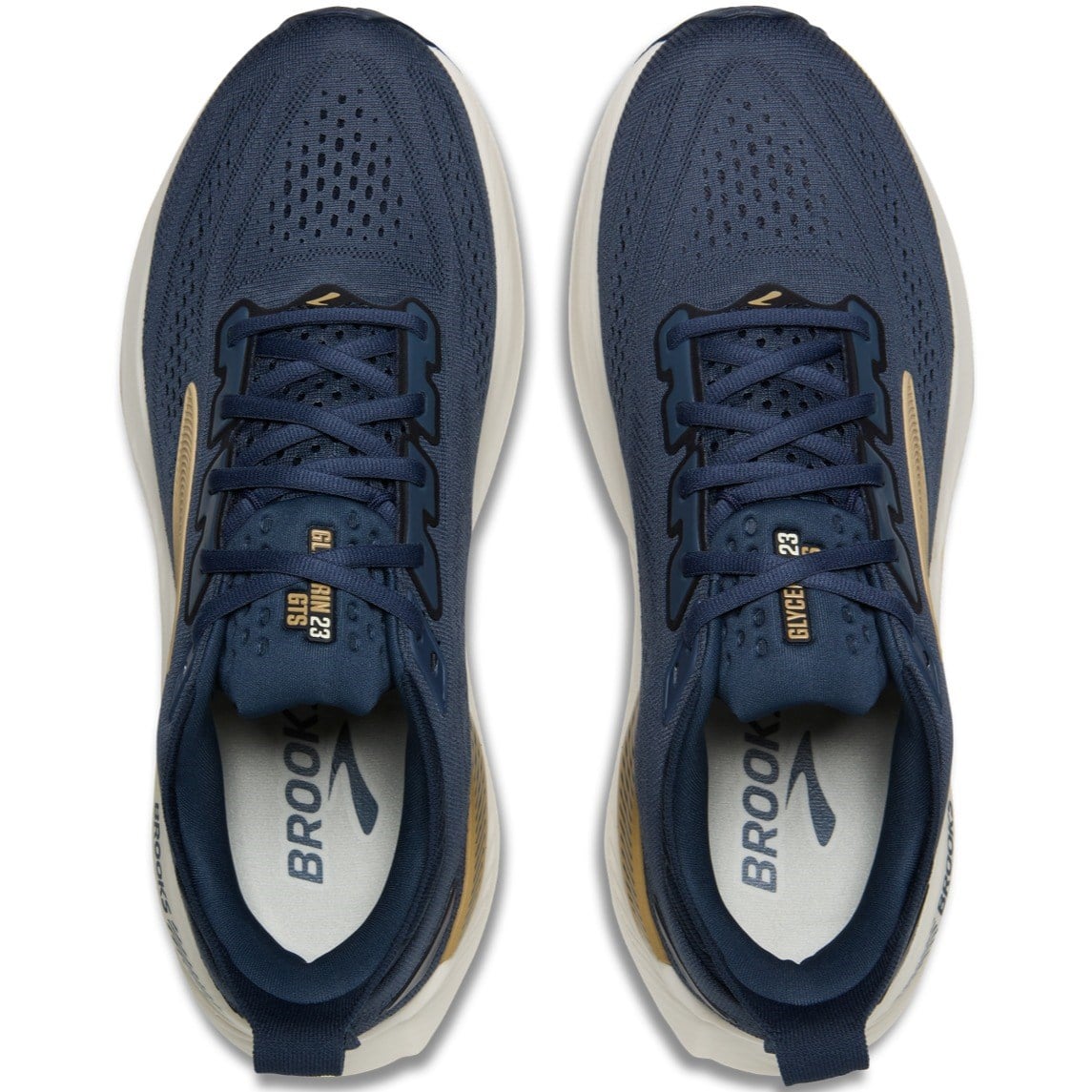 Pair of blue running shoes with white soles on a white background
