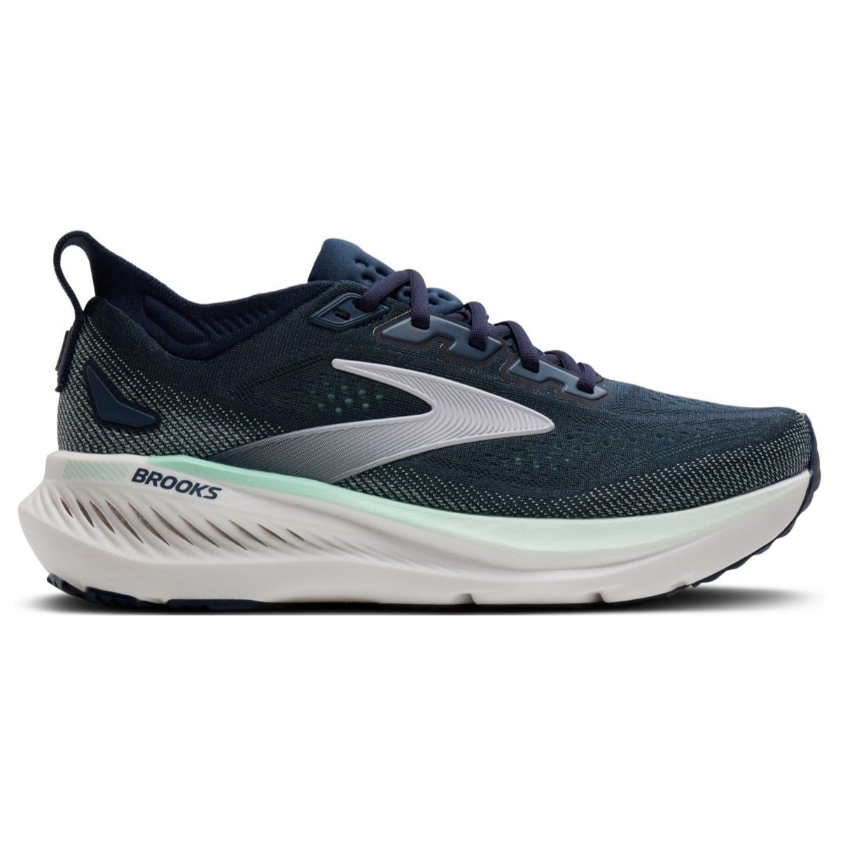 Navy running shoe with white sole on a white background