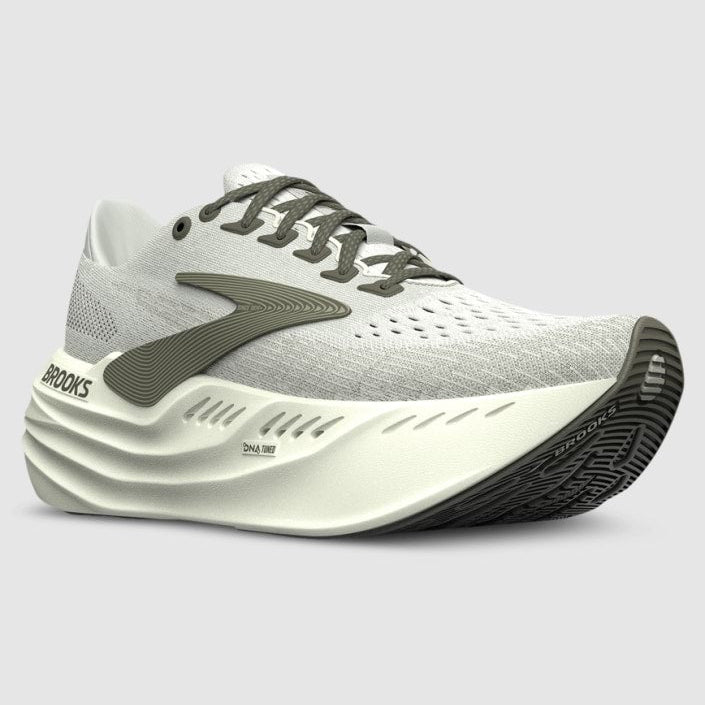 White and gray running shoe with black sole on a light gray background
