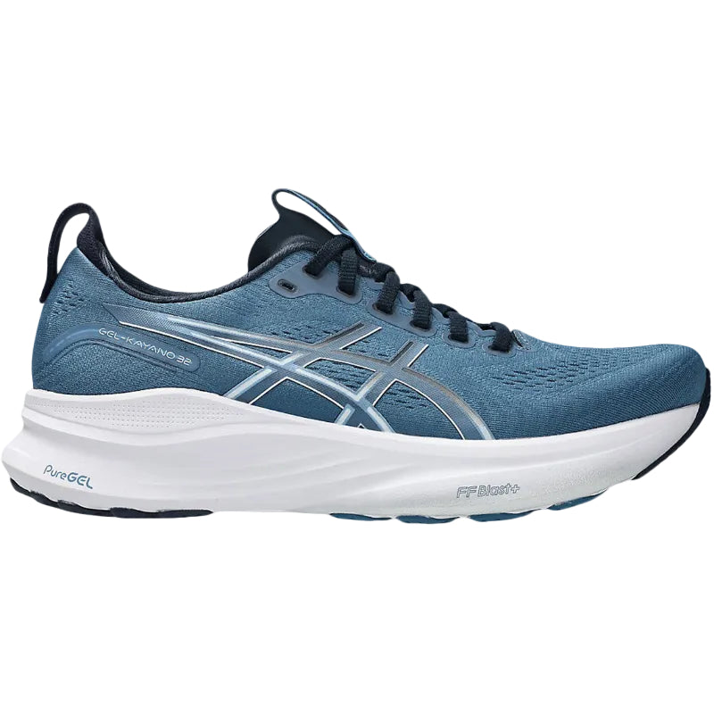 Blue running shoe with white sole on a white background