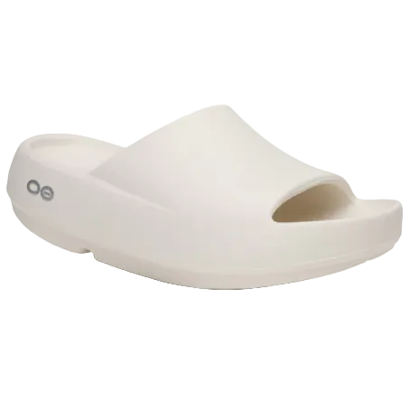 White sandal with a brand logo on a white background