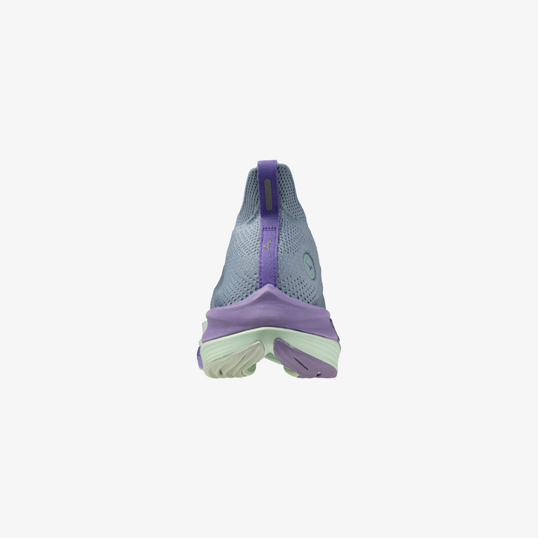 A women's Mizuno Neo Vista running shoe in paisley purple color, featuring a mesh upper, midfoot support, and a thick sole for cushioning.