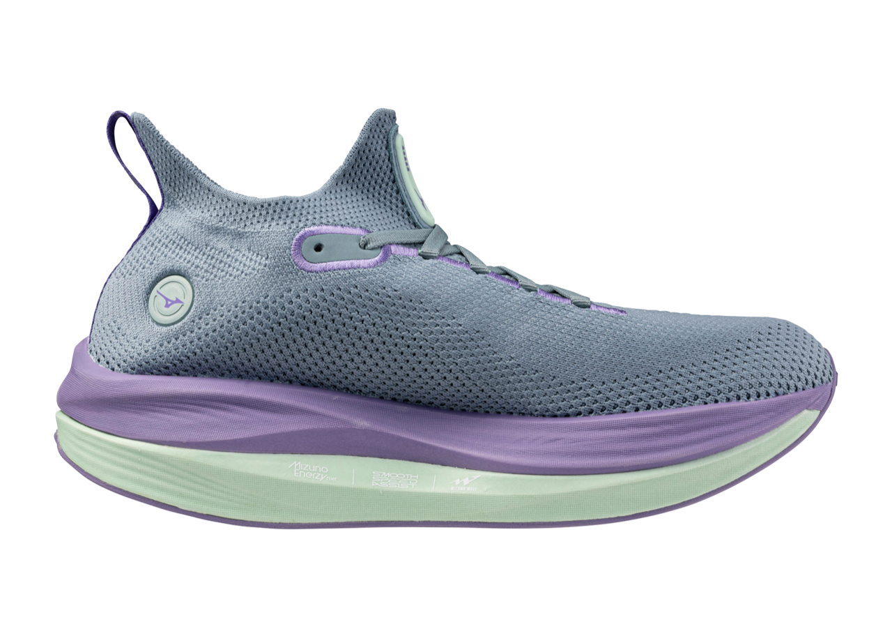 A women's Mizuno Neo Vista running shoe in paisley purple color, featuring a mesh upper, midfoot support, and a thick sole for cushioning.