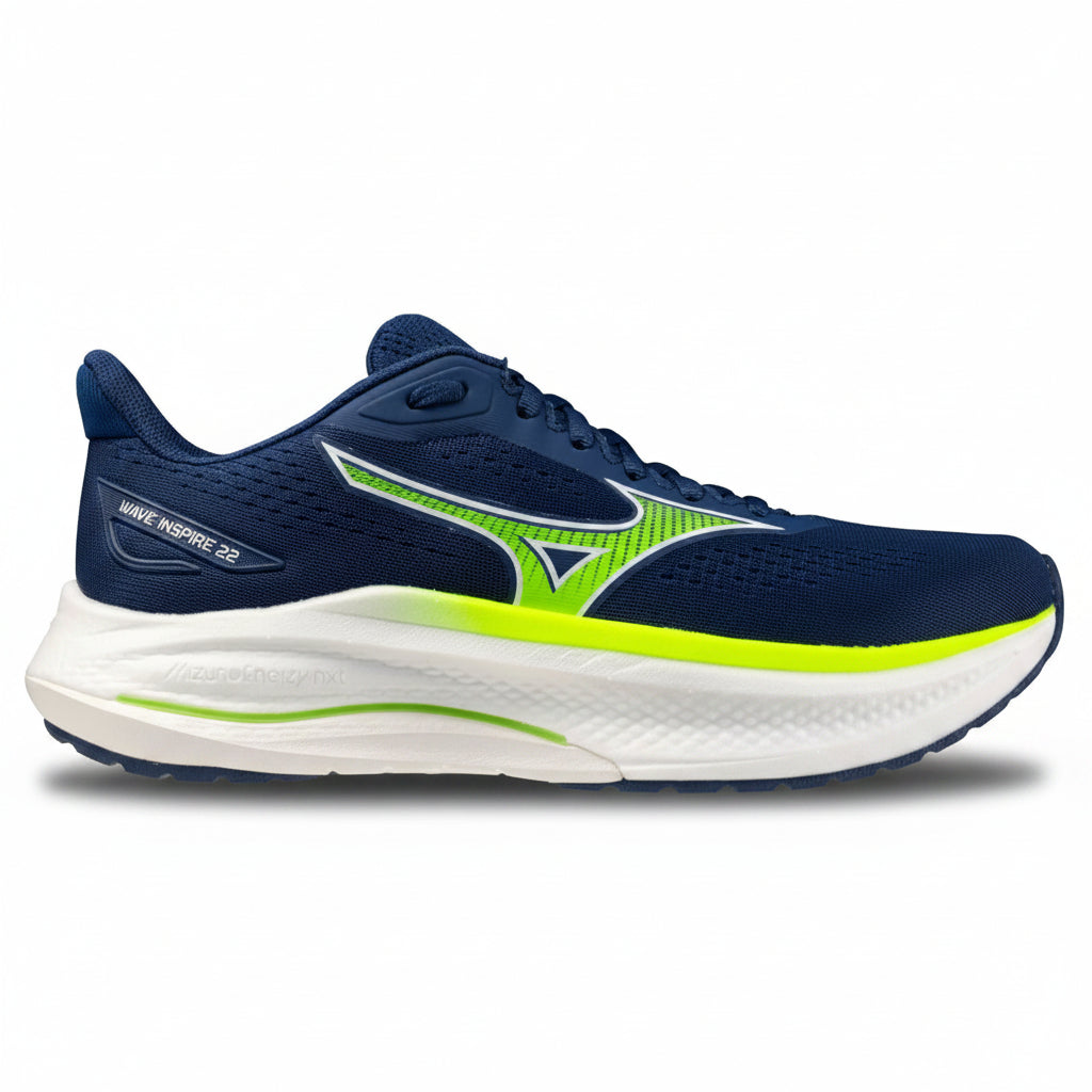 Navy and green running shoe with white sole on a white background