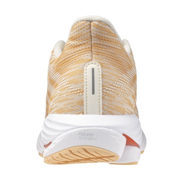 Back view of a running shoe with a white sole and beige upper on a white background