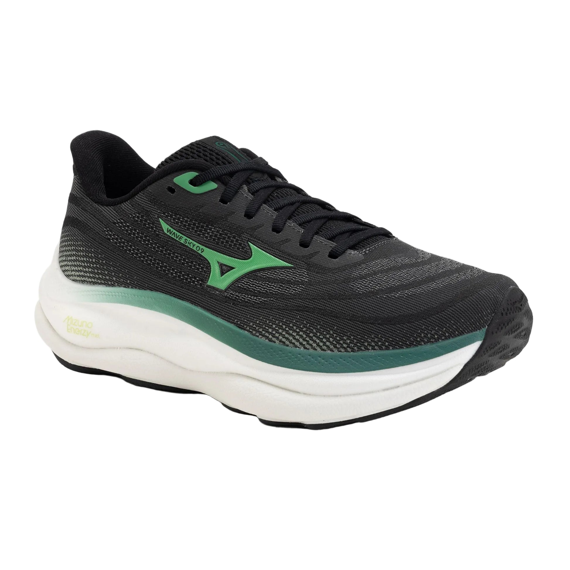 Black and green running shoe on a white background