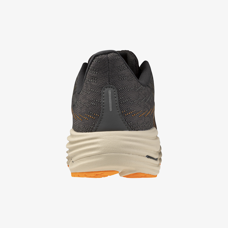 Gray and beige running shoe on a white background