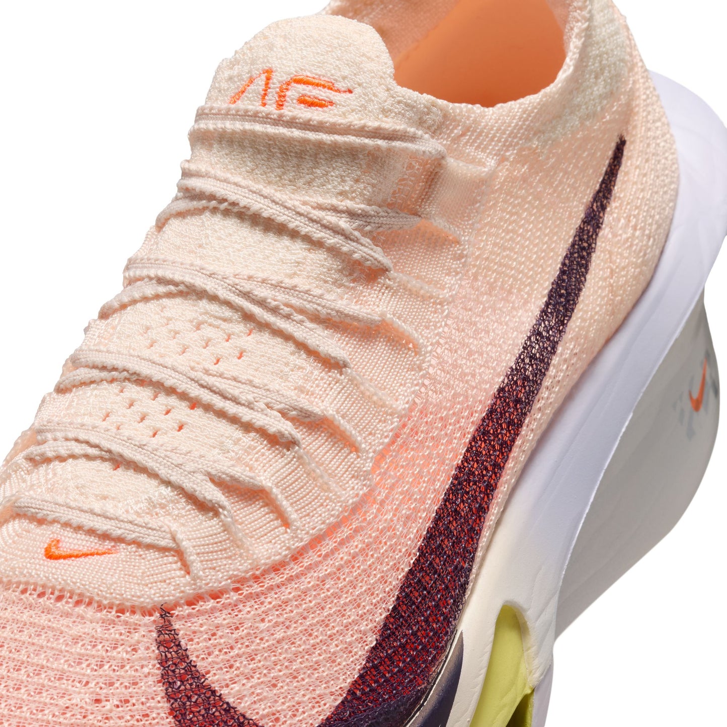 Close-up of a Nike running shoe with a focus on the brand logo.