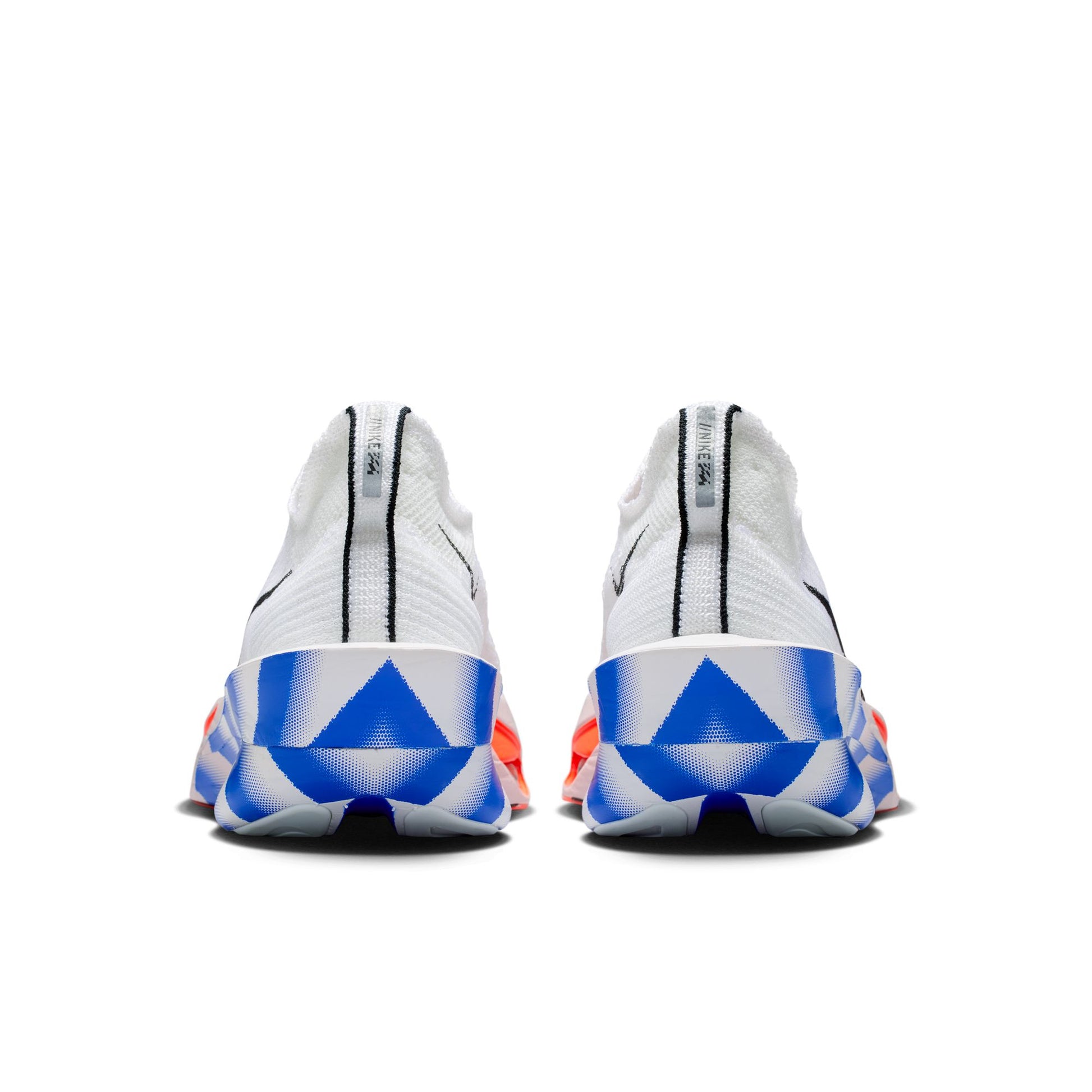 White soccer cleats with blue and red accents on a white background