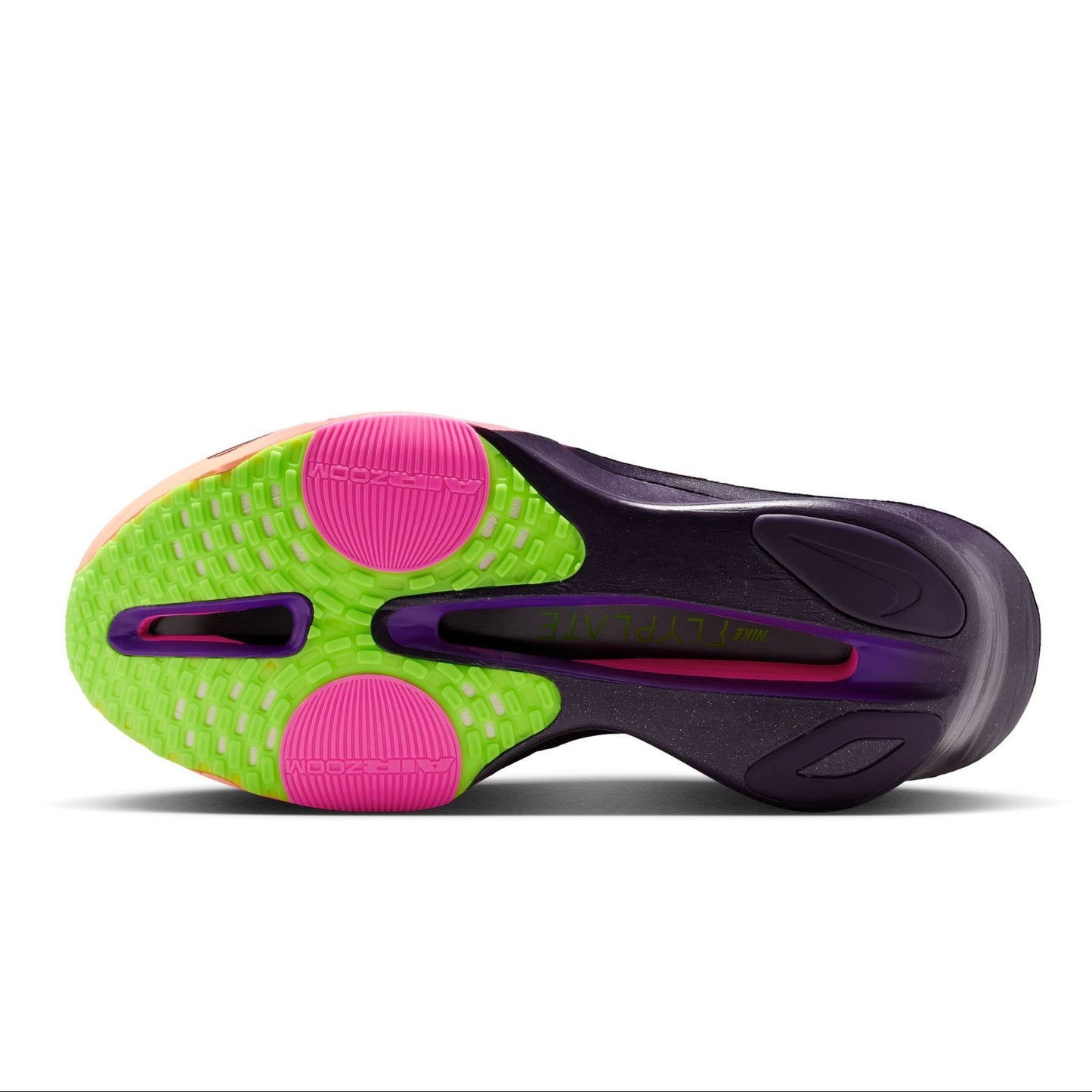 Close-up of a sports shoe sole with green, pink, and purple colors on a white background