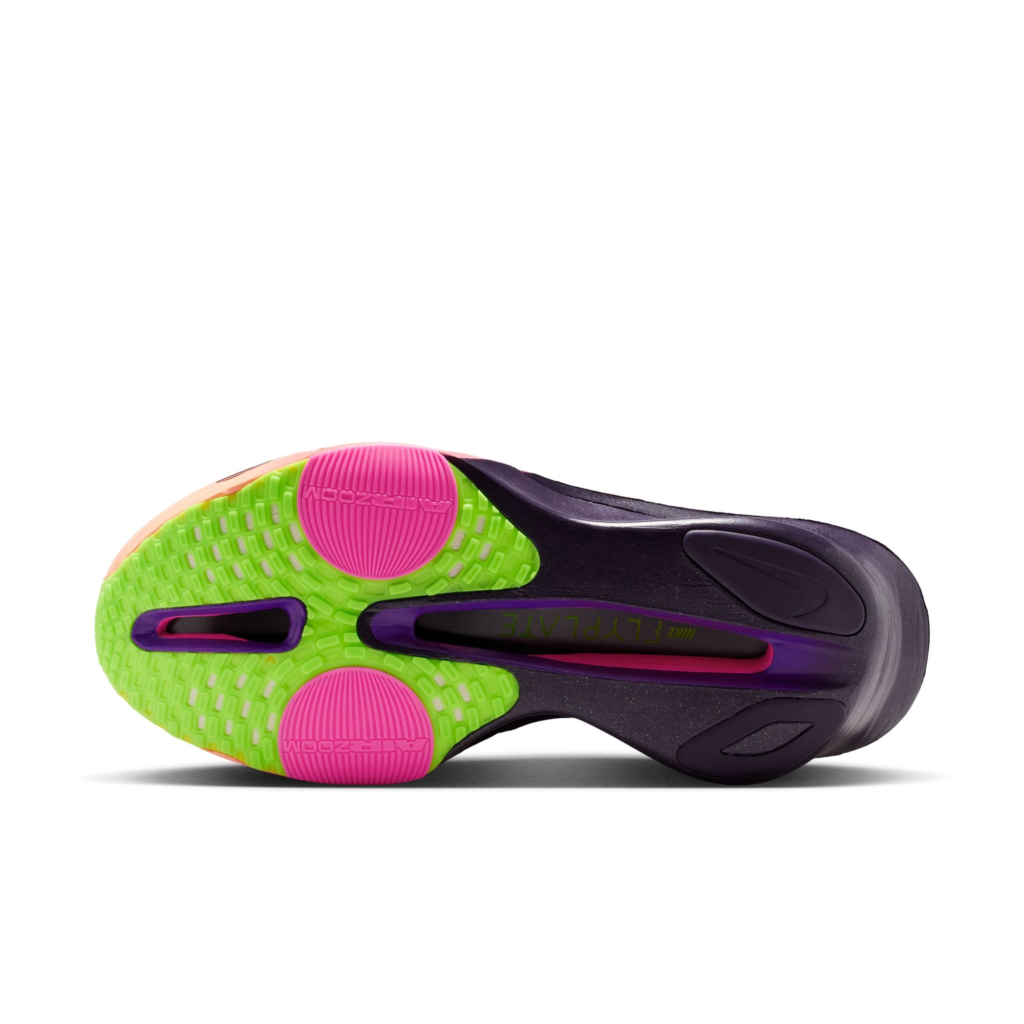 Close-up of a shoe sole with green, pink, and purple colors on a white background