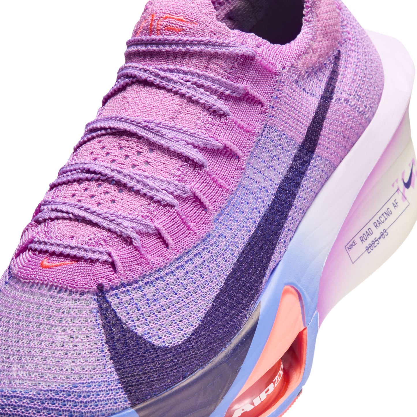 Purple running shoe with Nike logo on a white background