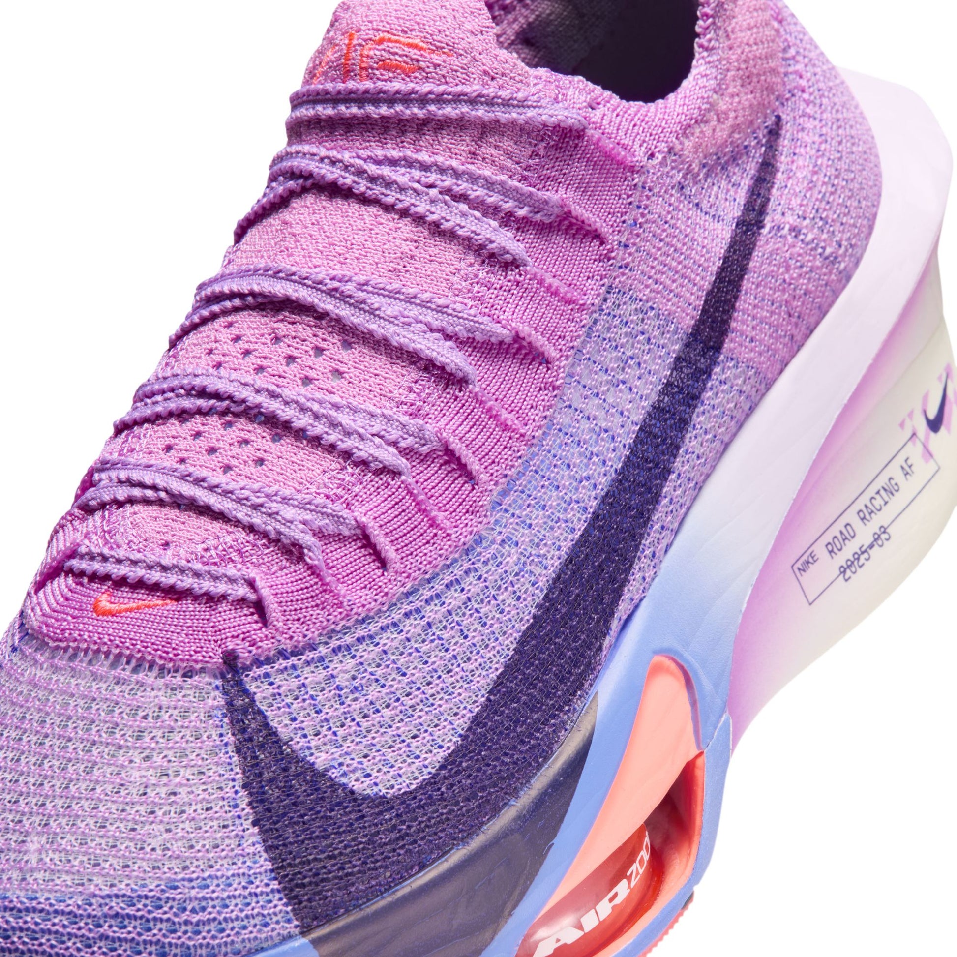 Purple running shoe with Nike logo on a white background