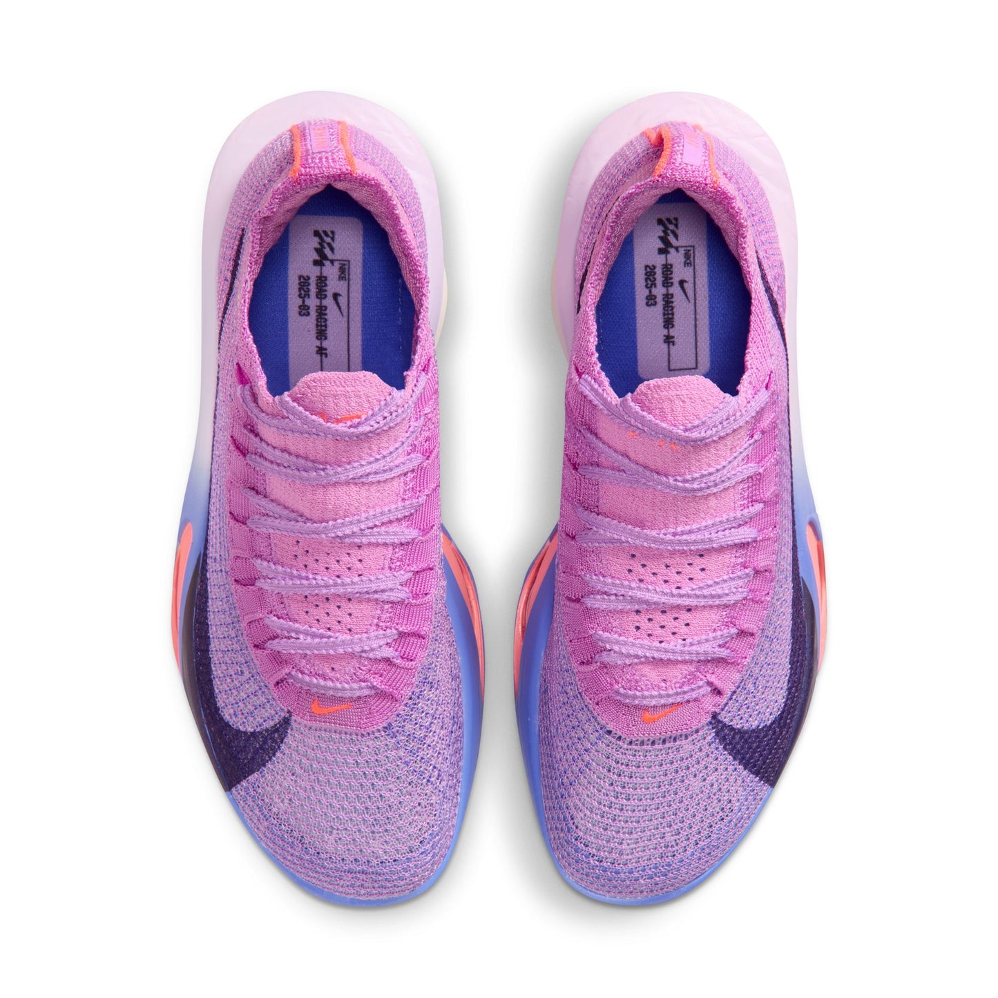 Pink and purple running shoes with Nike logo on a white background