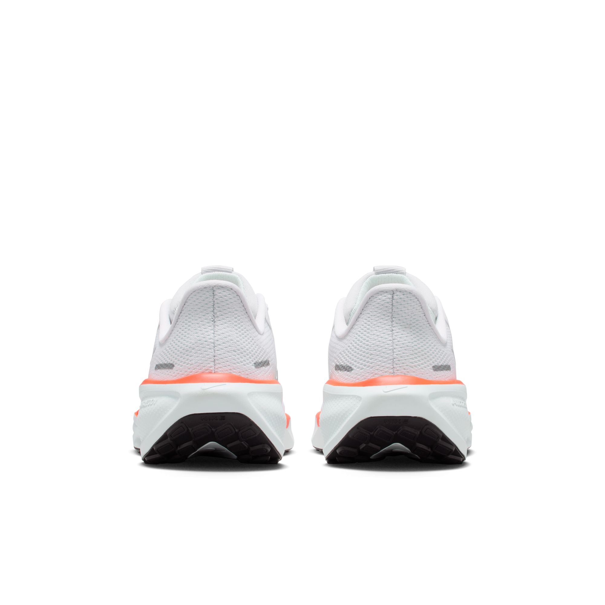 White running shoes with black soles on a white background