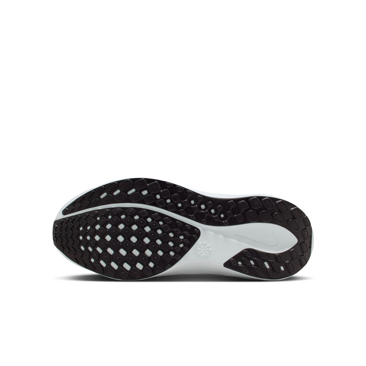 Close-up of a black and white shoe sole on a white background