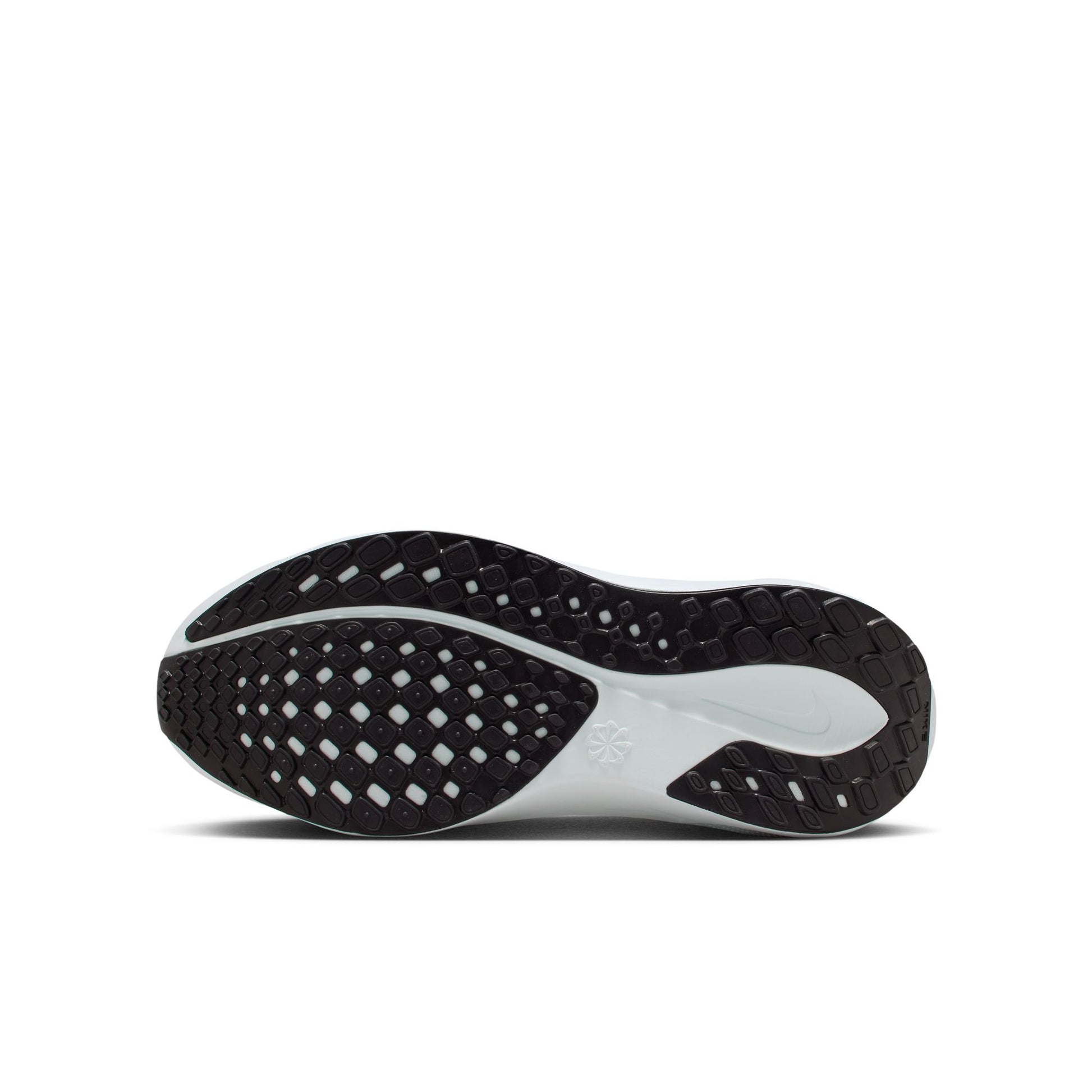 Close-up of a black and white shoe sole on a white background