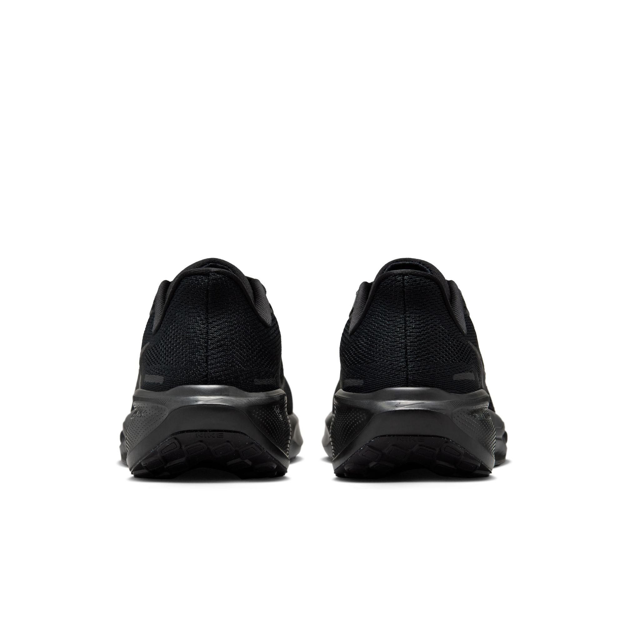 Black athletic shoes shown from the back on a white background