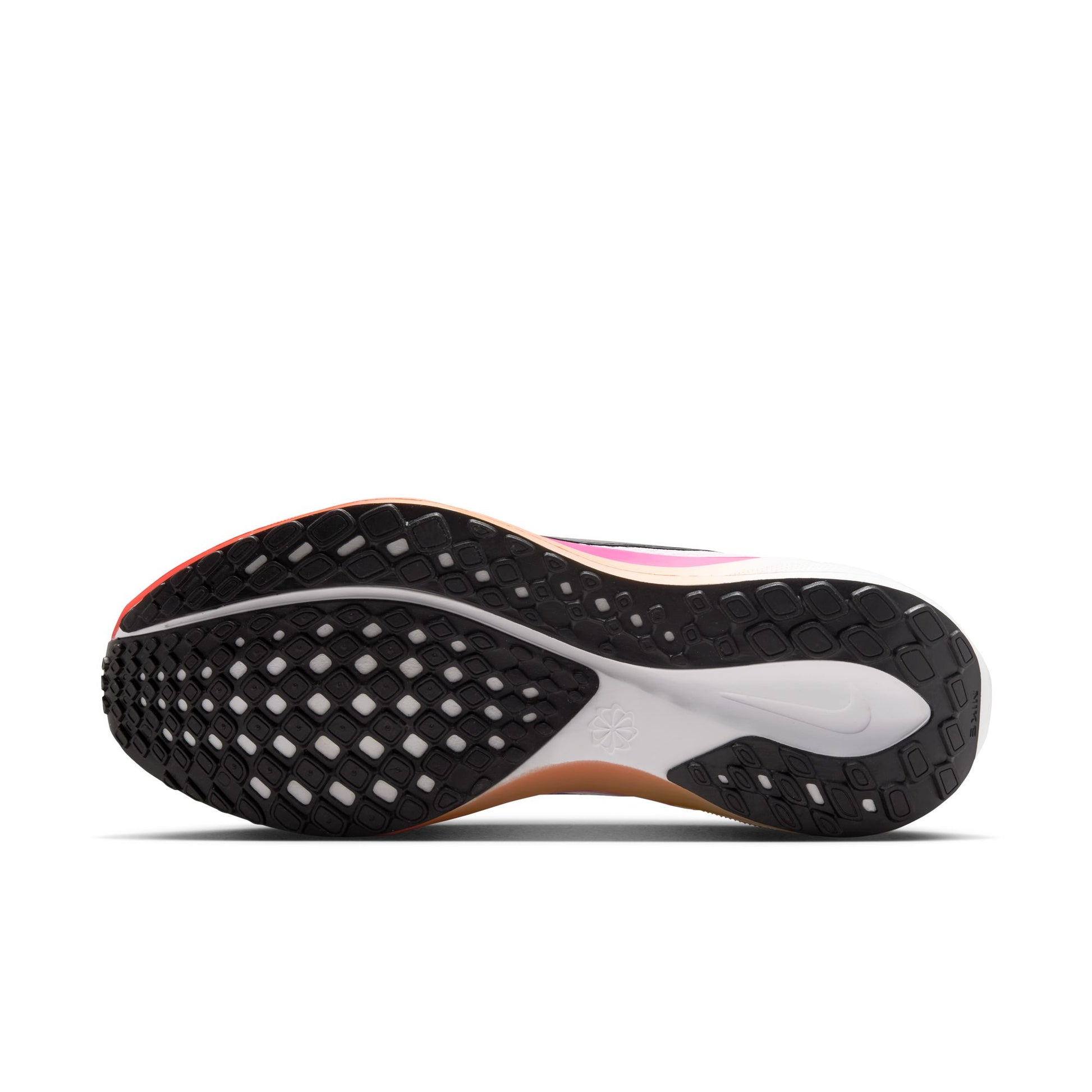 Close-up of a running shoe sole with tread pattern on a white background