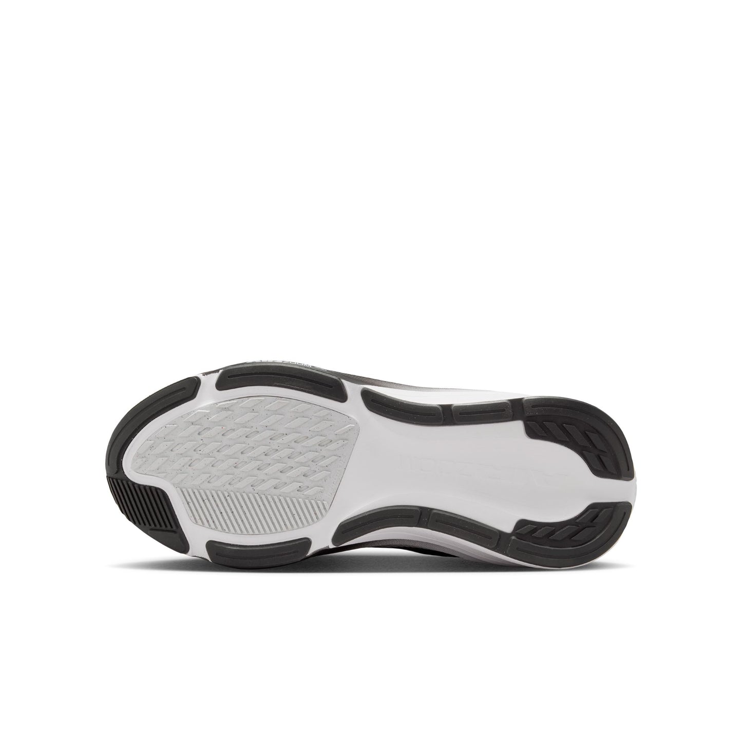 Side view of a black and white athletic shoe on a white background