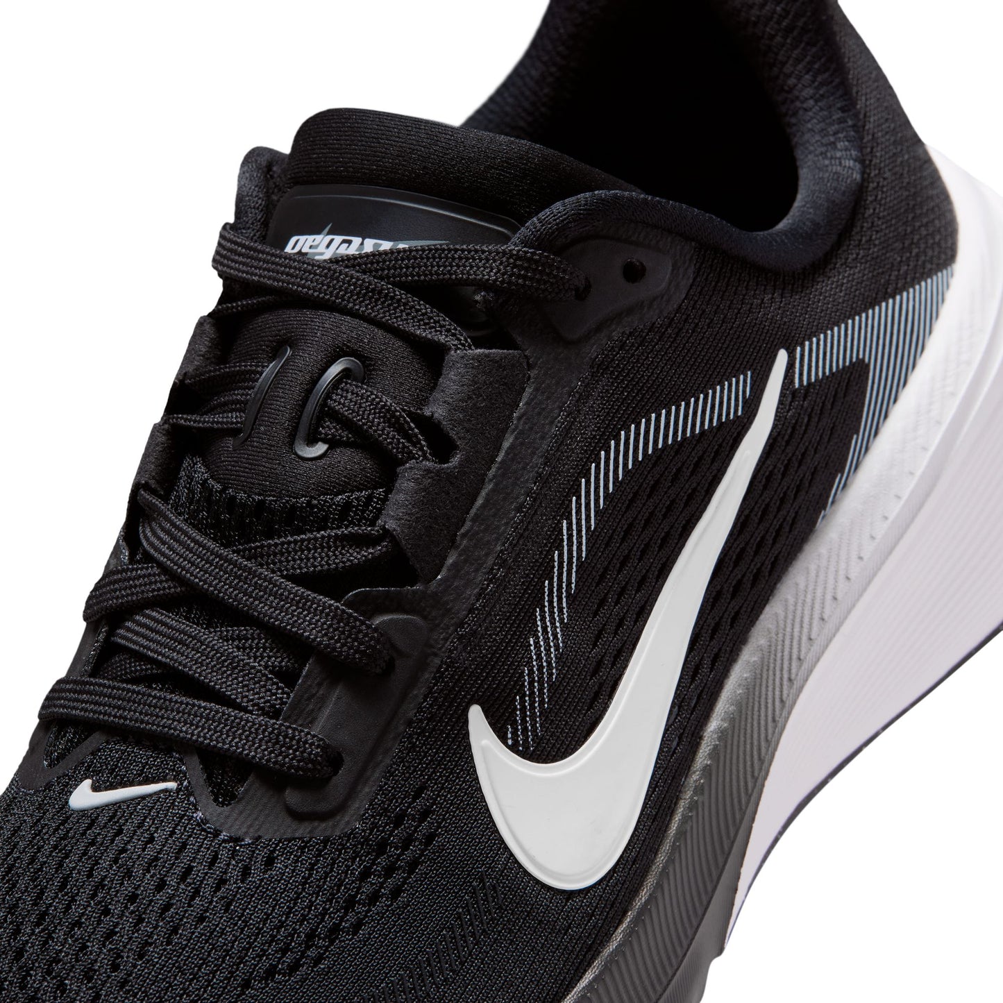 Black running shoe with white Nike logo on a white background
