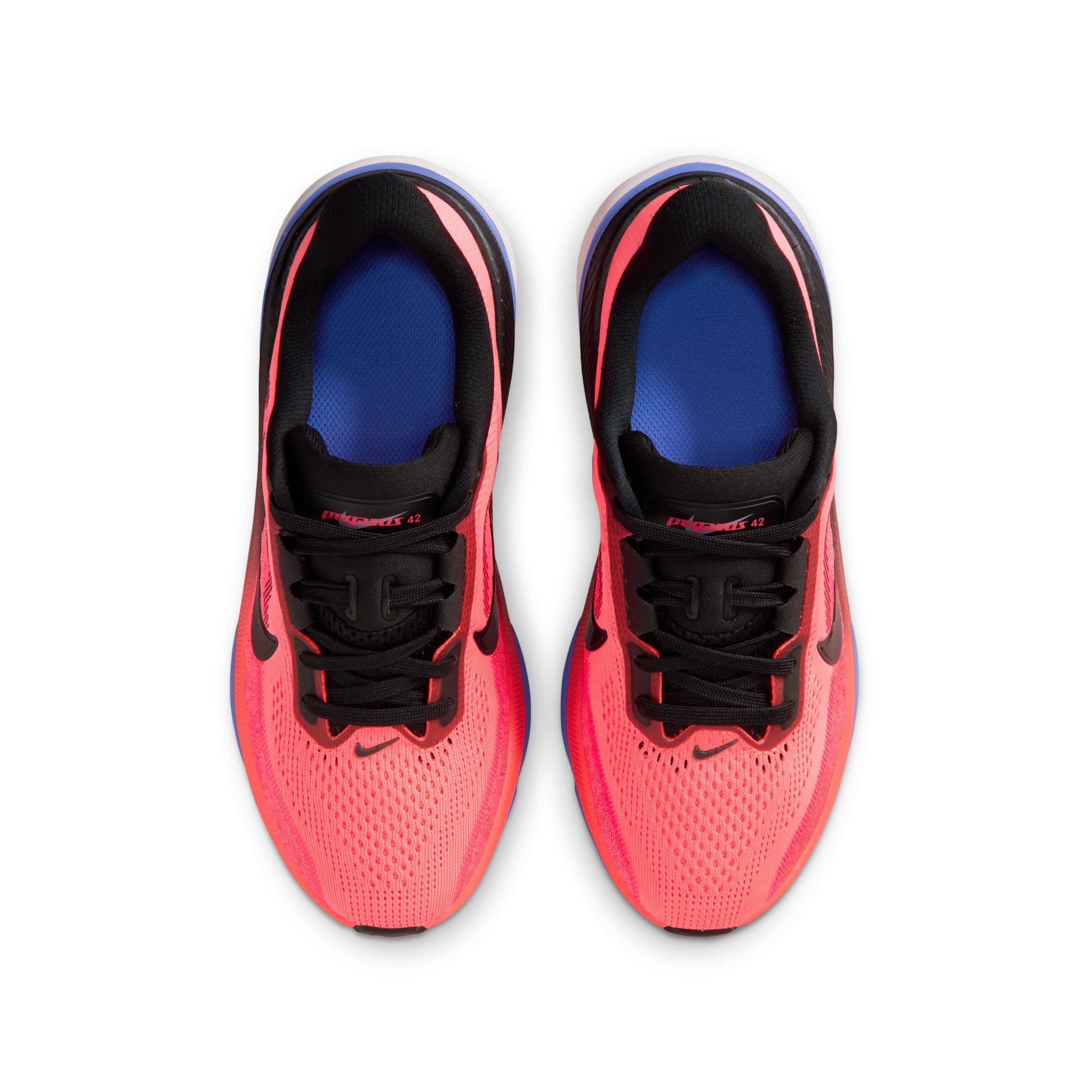 Pair of red and black athletic shoes on a white background