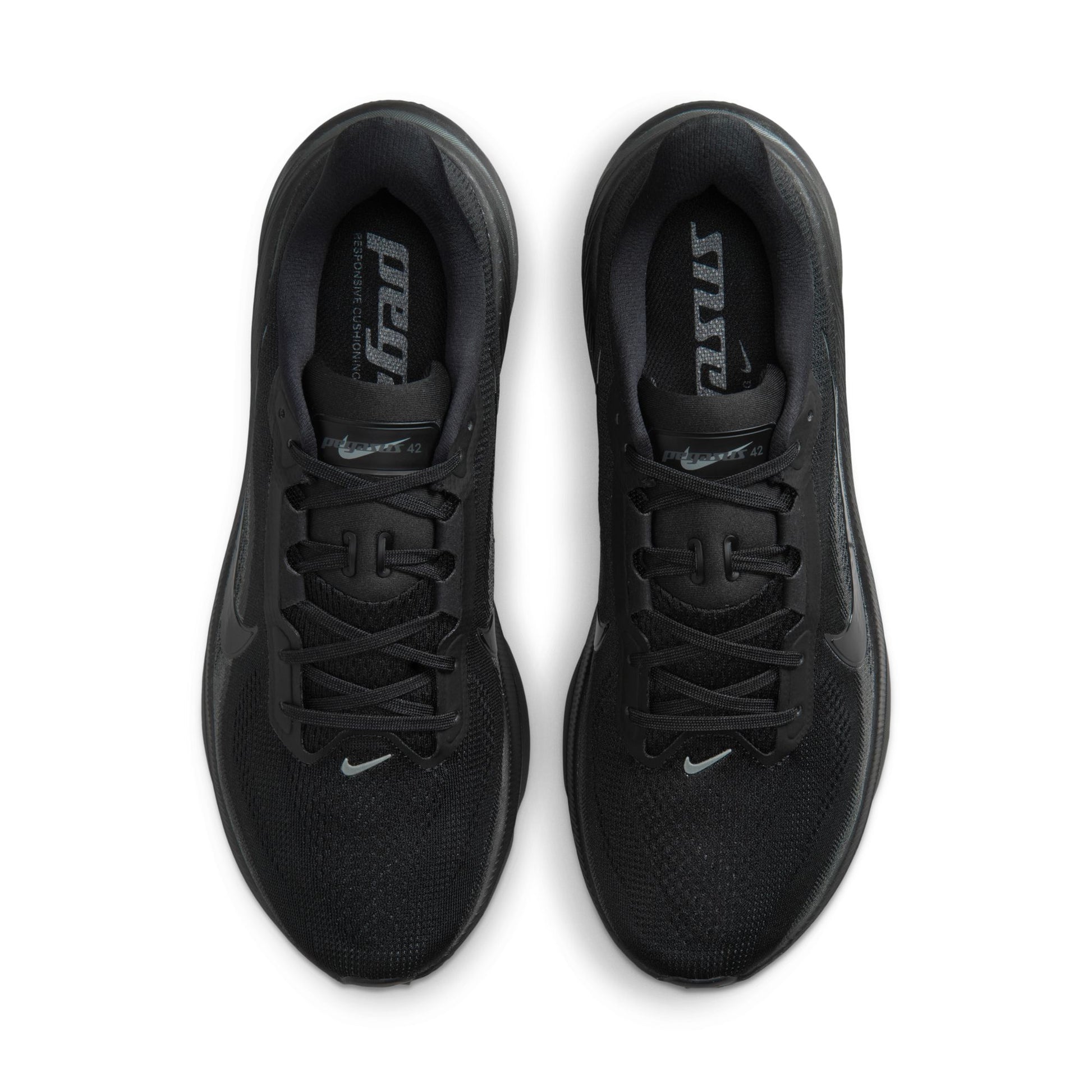 Black athletic shoes with laces on a white background top view