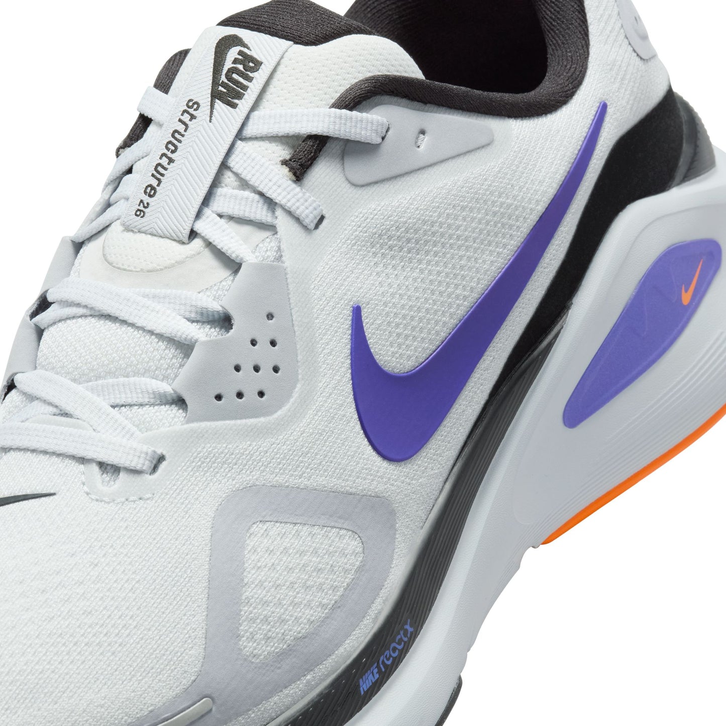 White Nike running shoe with purple swoosh logo on a white background