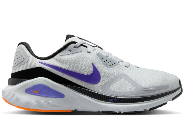 White running shoe with purple swoosh logo on a white background