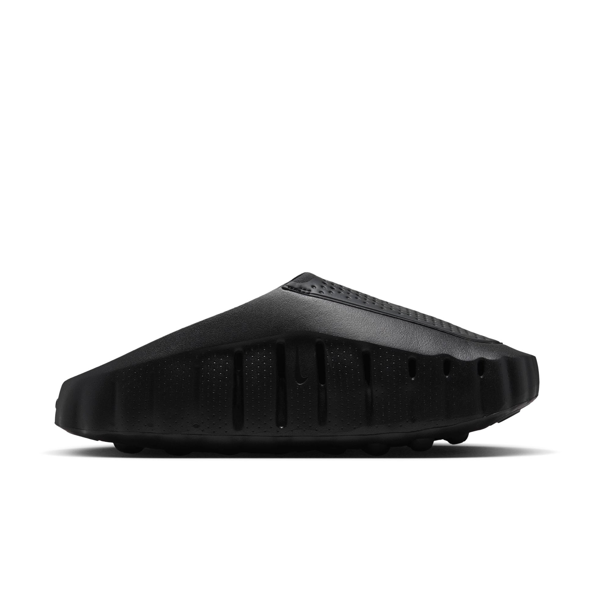 A single black slide sandal shown from a side profile view against a clean white background.