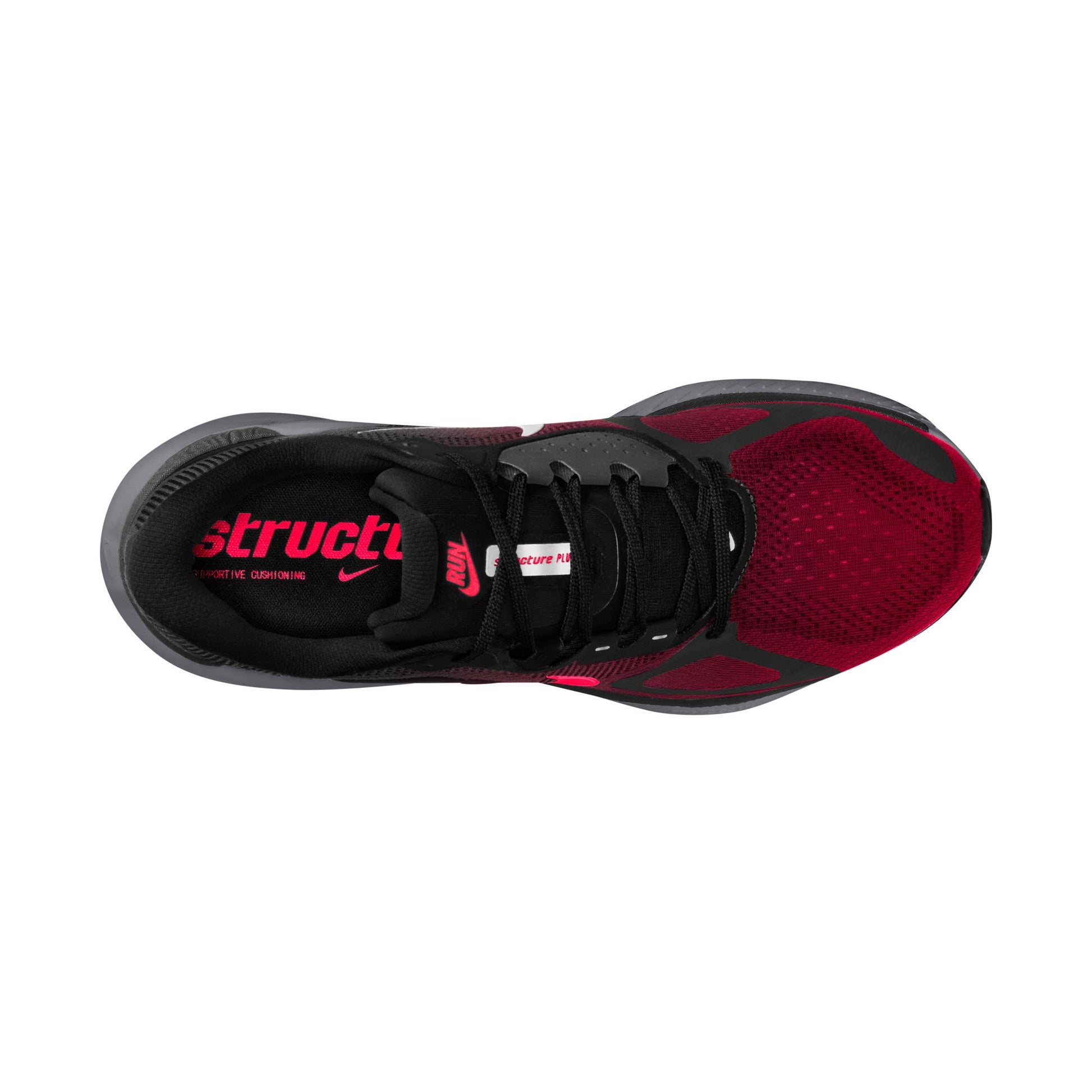 Black and red sneaker with visible branding on a white background