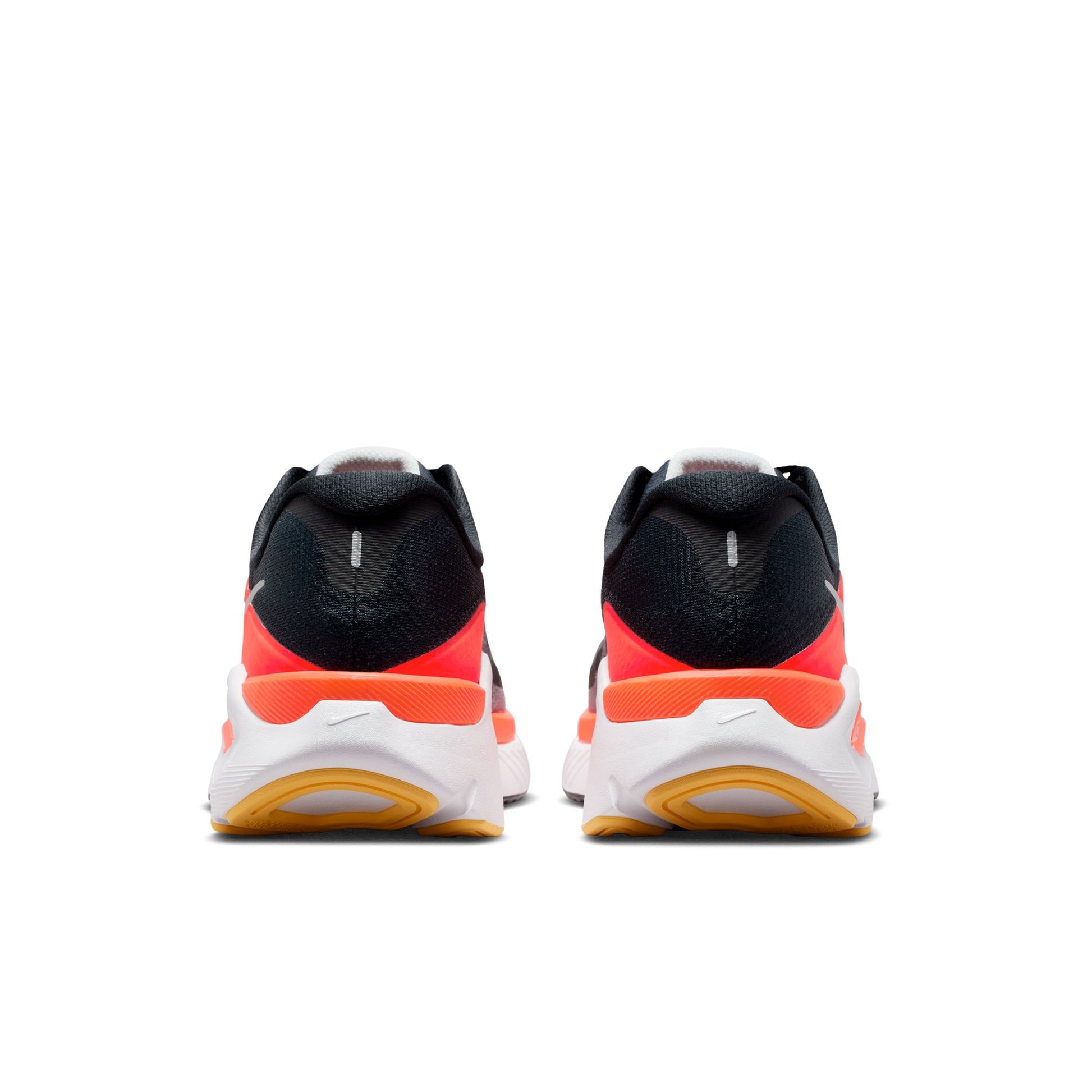 Black and orange athletic shoes on a white background